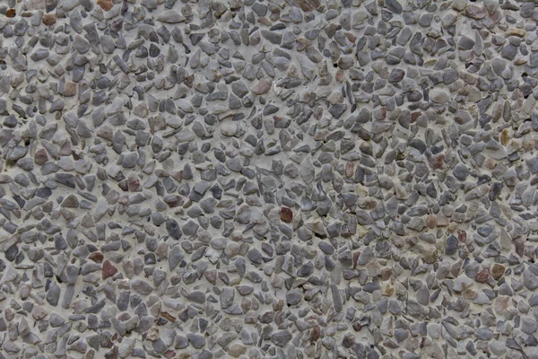 Close up of concrete with pebble grain — Stock Photo, Image