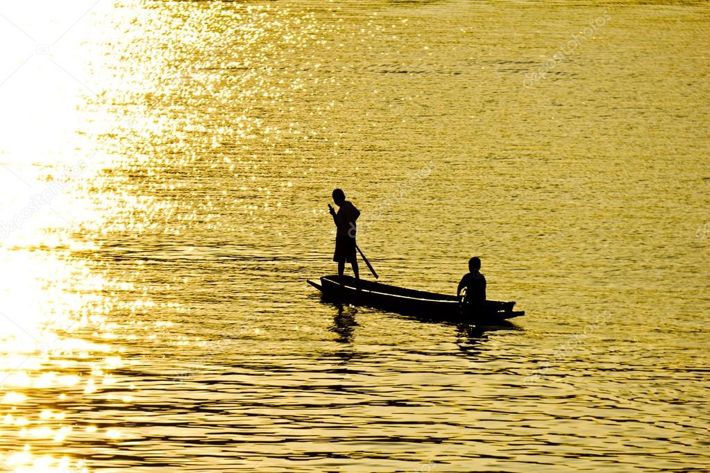 Two boys in a lonely boat