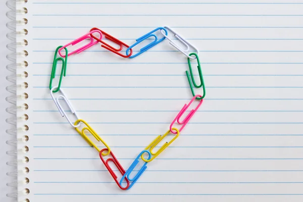 Clip heart on notebook paper — Stock Photo, Image