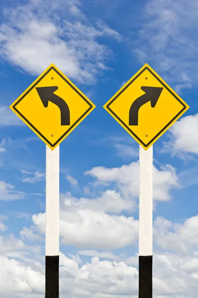 Left and right curved road signpost — Stock Photo, Image
