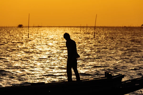 Silhouette de pêcheur — Photo