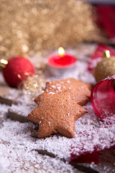Gingerbread star cookies with tealight — Stock Photo, Image