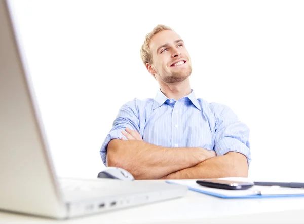 Young man at office daydreaming — Stock Photo, Image