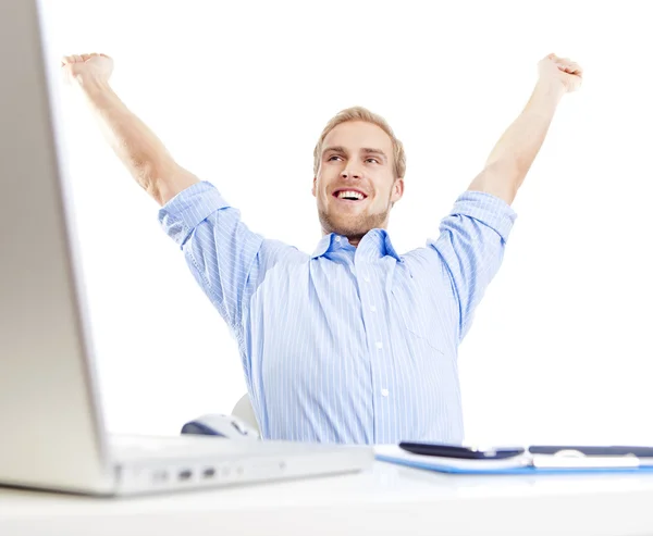 Young man at office triumphing — Stock Photo, Image