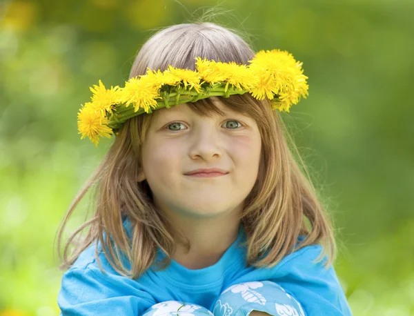 boy with flower wreath