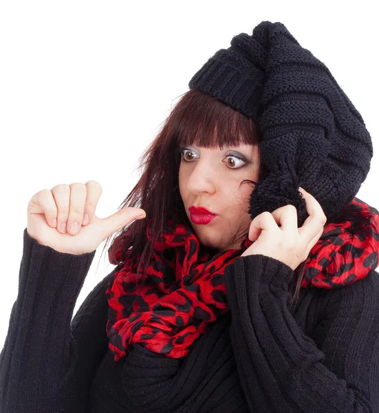 Young Woman with Black Cap Looking at her Thumb — Stock Photo, Image