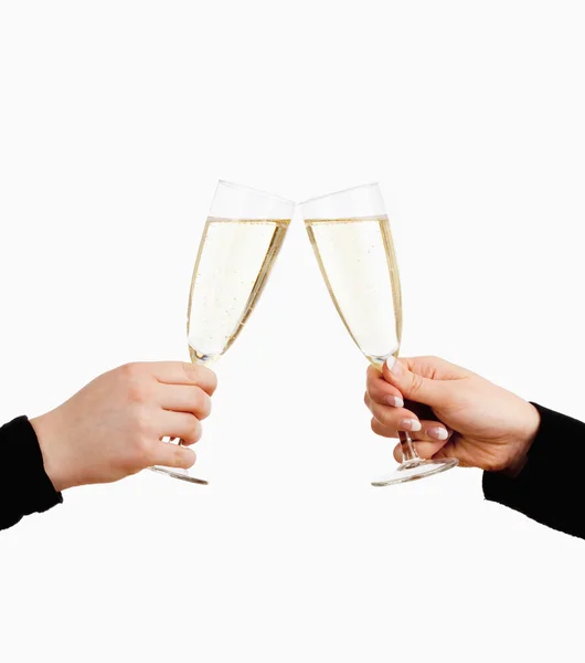 Duas mãos segurando copos de champanhe torrefação — Fotografia de Stock