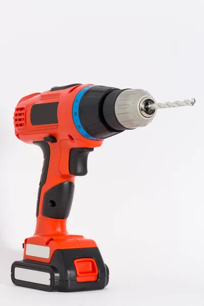 Cordless drill geïsoleerd met bits voor muur — Stockfoto