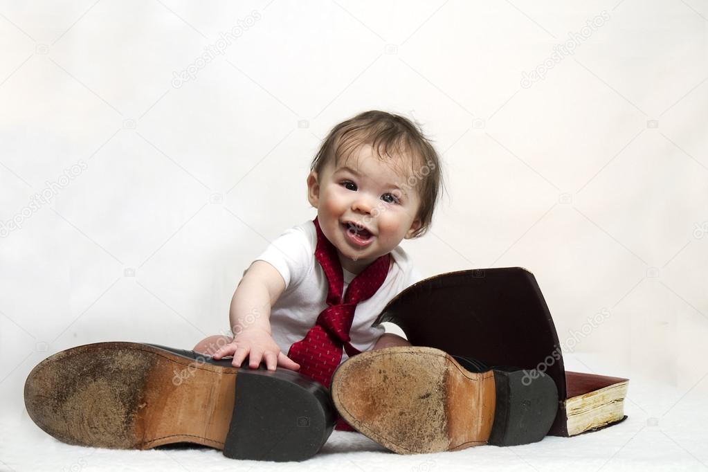 Baby in Daddy's Shoes