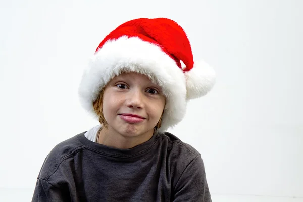 Menino vestindo chapéu de Santa — Fotografia de Stock