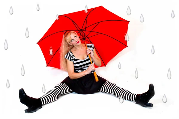 Девушка с красным зонтиком и фальшивыми капельками дождя — стоковое фото