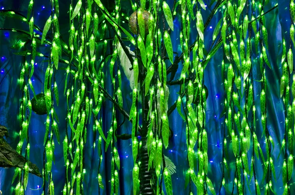 Beautiful festive background - green garland stylized in the sha — Stock Photo, Image