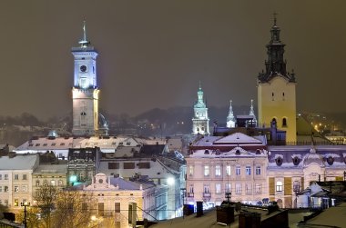 Beautiful winter cityscape in the center of Lvov city clipart