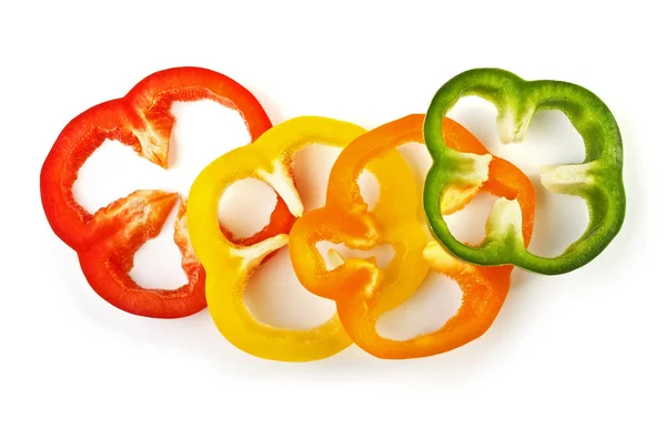 Gesneden zoete kleurrijke paprika's geïsoleerd over Wit — Stockfoto