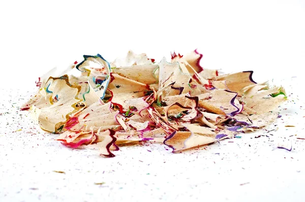 Shavings of colored pencils isolated over white — Stock Photo, Image
