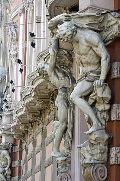 Sculpture on the facade of the house scientists in Lvov — Stock Photo, Image