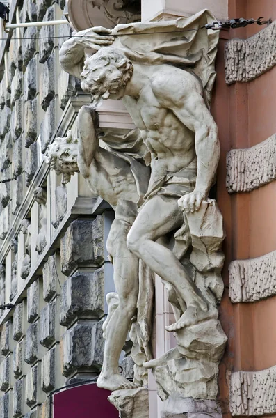 Sculpture on the facade of the house scientists in Lvov — Stock Photo, Image