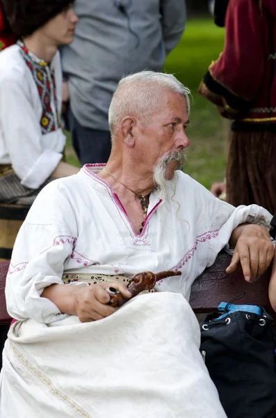 Cossack sitting on the bench — Stock Photo, Image