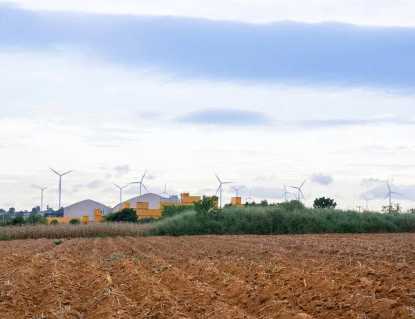 Wind turbines of global ecology with cloud background on the sky. alternative electricity source to be sustainable resources in the future. Clean energy concept saves the world.