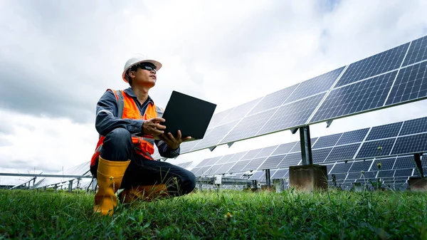 The solar farm(solar panel) with engineers check the operation of the system, Alternative energy to conserve the world\'s energy, Photovoltaic module idea for clean energy production.