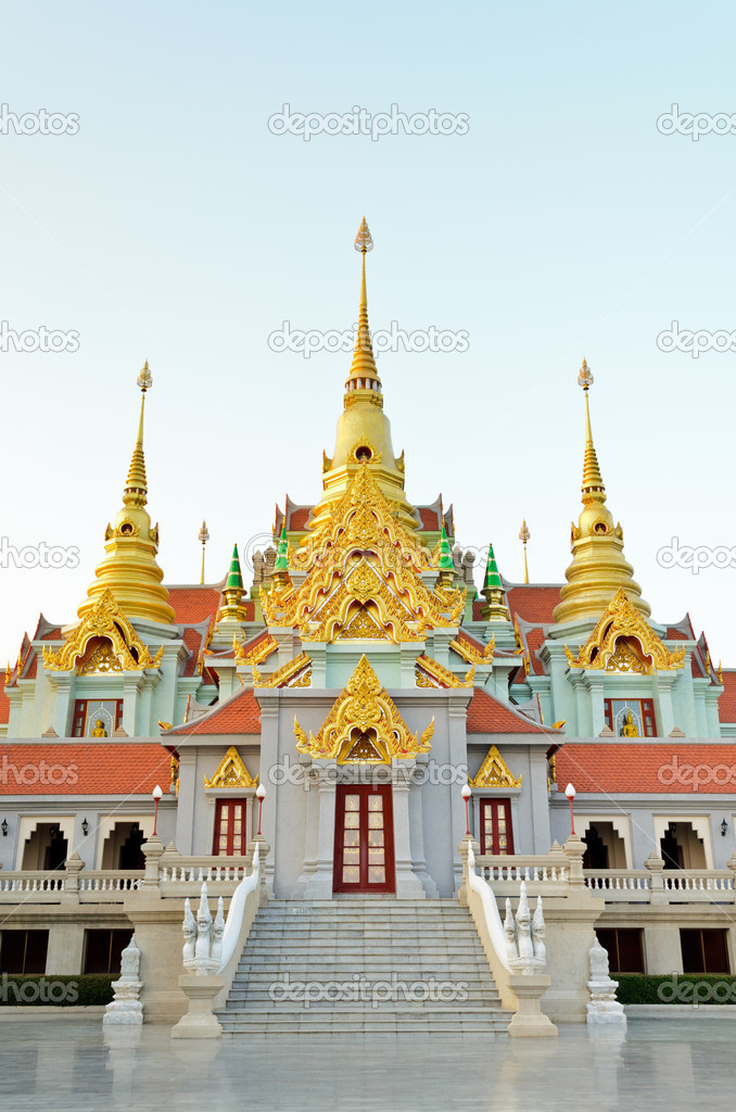 Beautiful golden pagoda Phra Mahathat Chedi Phakdi Prakat