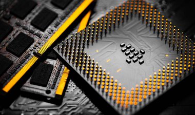 Macro Close up of RAM Memory and pins on Main CPU PC processor circuit board.	