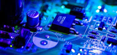 Macro Close up of components and microchips on PC circuit board.	