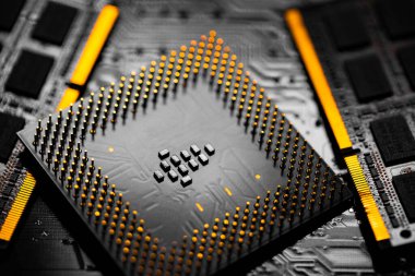 Macro Close up of RAM Memory and pins on Main CPU PC processor circuit board.	