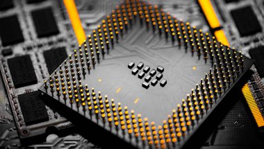 Macro Close up of RAM Memory and pins on Main CPU PC processor circuit board.	