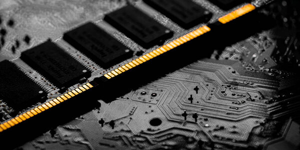 Macro Close up of computer RAM chip; random access memory slot for PC motherboard