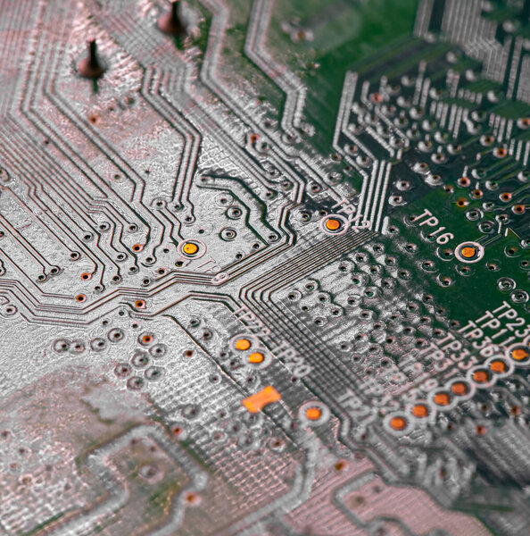Macro Close up of printed wiring on PC circuit board of modem router	