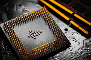 Macro Close up of RAM Memory and pins on Main CPU PC processor circuit board.	