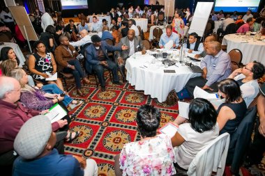 Johannesburg, South Africa - November 28, 2013: Diverse delegates attending a networking and leadership workshop