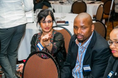 Johannesburg, South Africa - November 28, 2013: Diverse delegates attending a networking and leadership workshop