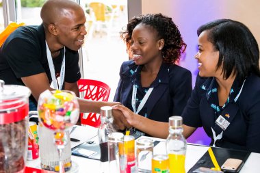 Johannesburg, South Africa - February 24, 2014: Diverse College students attending a business leadership workshop