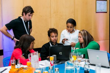 Johannesburg, South Africa - February 24, 2014: Diverse College students attending a business leadership workshop