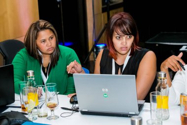 Johannesburg, South Africa - February 24, 2014: Diverse College students attending a business leadership workshop