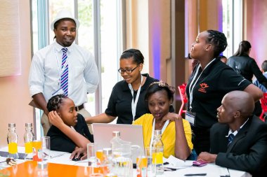 Johannesburg, South Africa - February 24, 2014: Diverse College students attending a business leadership workshop