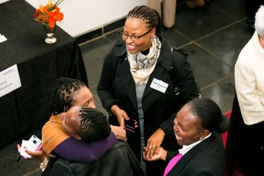 Johannesburg, South Africa - July 14, 2014: Diverse woman networking at corporate convention event