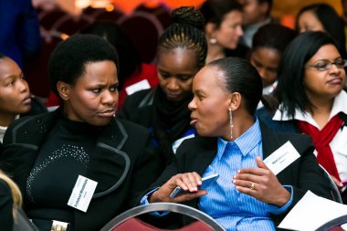 Johannesburg, South Africa - July 14, 2014: Diverse woman networking at corporate convention event