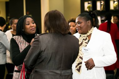 Johannesburg, South Africa - July 14, 2014: Diverse woman networking at corporate convention event