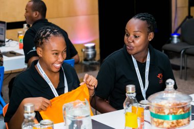 Johannesburg, South Africa - February 24, 2014: Diverse College students attending a business leadership workshop