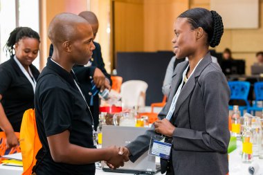 Johannesburg, South Africa - February 24, 2014: Diverse College students attending a business leadership workshop