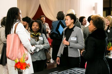 Johannesburg, South Africa - July 14, 2014: Diverse woman networking at corporate convention event