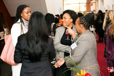 Johannesburg, South Africa - July 14, 2014: Diverse woman networking at corporate convention event