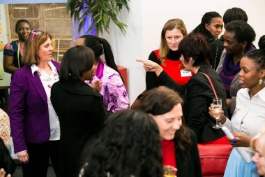 Johannesburg, South Africa - July 14, 2014: Diverse woman networking at corporate convention event
