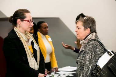 Johannesburg, South Africa - July 14, 2014: Diverse woman networking at corporate convention event