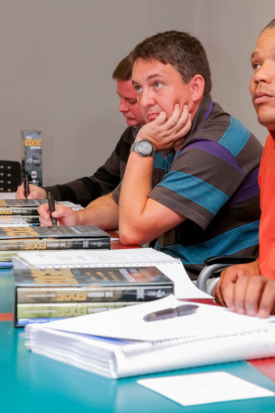 Johannesburg, South Africa - May 7, 2012: Mature students attending a class in College