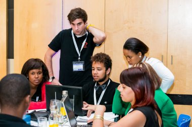 Johannesburg, South Africa - February 24, 2014: Diverse College students attending a business leadership workshop