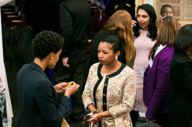 Johannesburg, South Africa - July 14, 2014: Diverse woman networking at corporate convention event